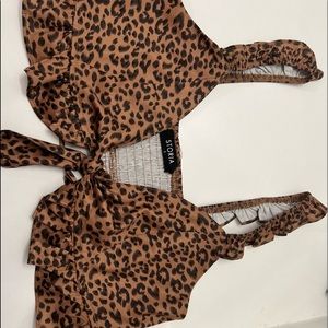 Cheetah print tie top. Size S. Brand: Storia